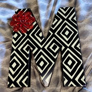 Black & Off White Diamond Design Letter M
